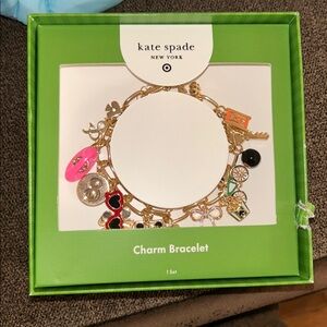 Kate Spade Gold Charm Bracelet with Pink and Black Accents